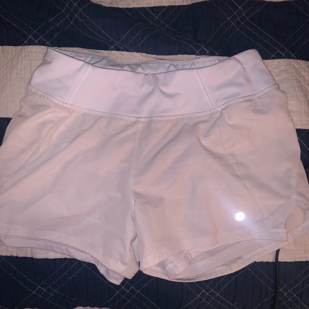 White shorts with spandex underneath
